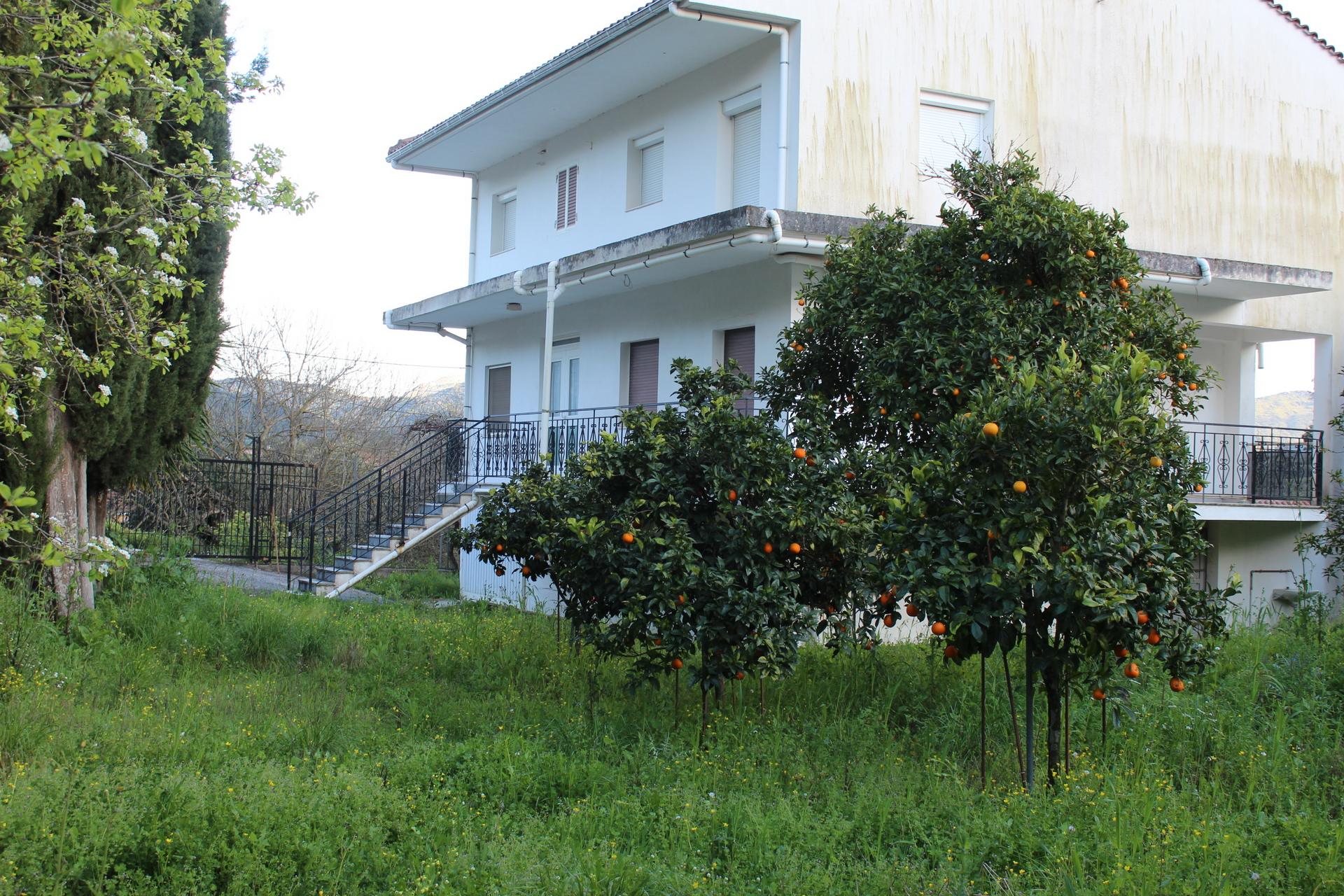 Two-story house at Tzannata